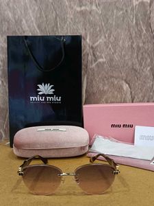 Miu-Miu Sunglasses - Pink Oval Fram