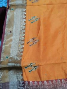 Beautiful Orange Silk Saree with Peacock Border