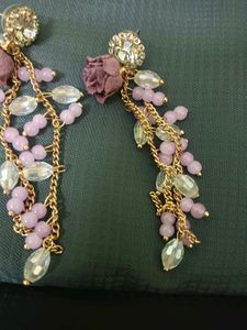 Elegant Dangle Earrings with Floral Accent