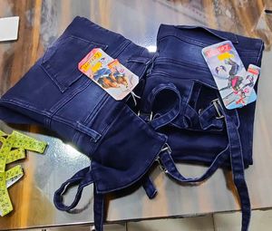 High Waist Ripped Jeans with Button upRings