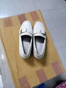 Stylish White Loafers with Buckle Accent