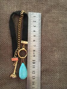 Turquoise and leather band bracelet