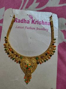 Elegant Gold Necklace with Colorful Stones