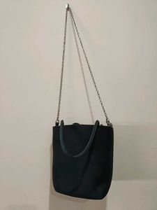 Rhinestone studded smiley face crossbody bag