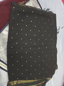 Elegant Black Saree with Gold Dots