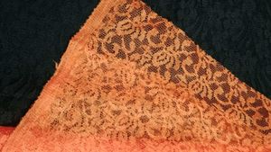 Elegant black, orange, cream net fabric