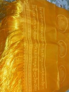 Traditional yellow Tibetan khata scarf