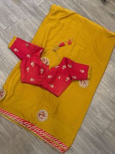 Yellow Saree with Red Embroidered Blouse