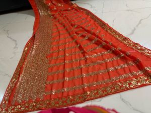 Vibrant Orange Sequined Saree