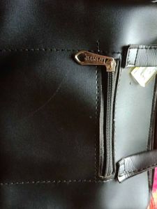 Chic Black Handbag with Bow Detail