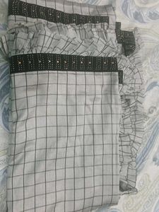 checked  saree beautiful frill N esigner blouse