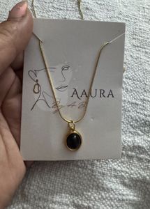 Elegant Gold Necklace with Black Stone