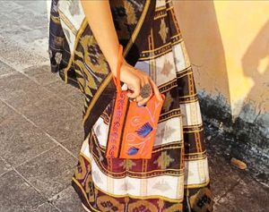 Embroidered Orange Hand Purse
