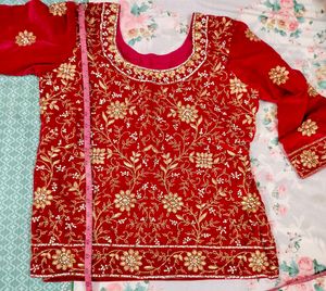 Rani pink Embroidered Lehenga Choli