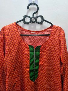 Orange Printed Kurta with Green Neckline