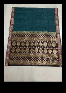 Elegant Teal Saree with Gold Border