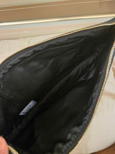 Chic Black Clutch with Gold Chain Detail