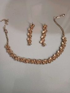 orange necklace with earning