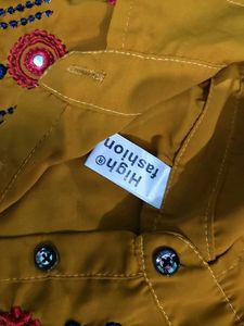 Stylish Mustard shirt top with Tassels
