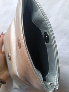 Clinique silver metallic foldable clutch 💕♥️