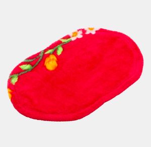Vibrant Red Oval Doormat with Floral Design