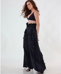 Edgy Black Wide-Leg Jeans with Fringe Detail