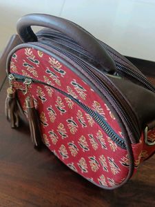 Round Sling Bag with Tassels