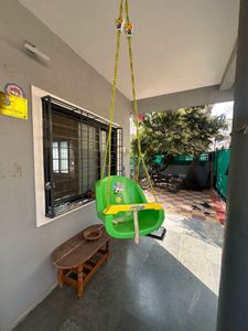 Kids Green and Yellow Swing