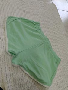 PRIMARK Light Green Dolphin Shorts