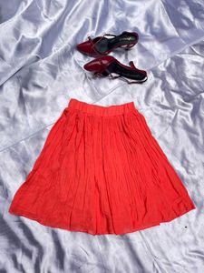 Vibrant Orange Pleated Skirt