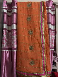 Elegant Orange Saree with Gold Border