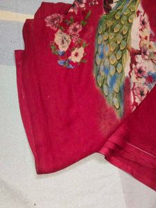 Vibrant Red Saree with Peacock Print