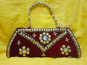 Dark maroon Fancy Clutch...