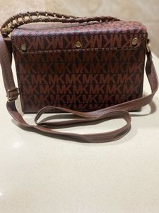 Brand new Brown Michael Kors Sling Bag