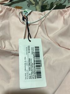 Newme light pink pleated micro mini dress