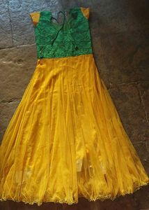 Yellow Net Gown with Green Floral Bodice