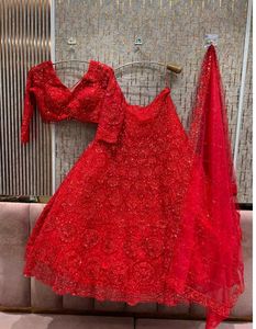 Stunning Red Embellished Lehenga Choli