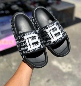 Balmain Paris Logo Slides