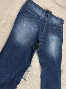 Distressed Mesh Panel Jeans