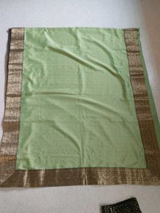 Elegant Light Green Saree with Black Blouse