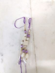 PURPLE COLOUR RAKHI FOR BHAIYA ND BHABHI