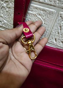 leather cut out sling bag