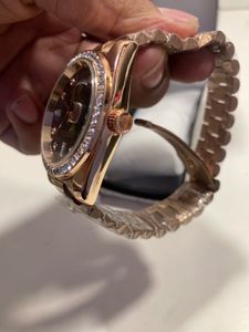 Rose Gold Rolex Watch with Green Dial