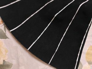 Black Pleated Skirt With White Strips