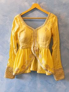 Yellow Embroidered Peplum Blouse