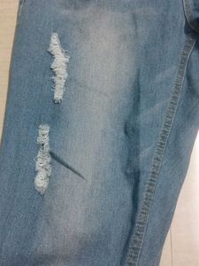 Light Wash Distressed Denim Jeans