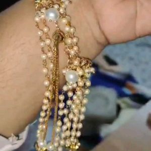 Elegant Gold Watch with Charms