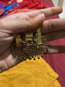 Golden chandbali with green small pearls