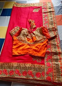 Beautiful Embroidered Red Saree with Orange Blouse