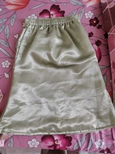 one shoulder bow top with skirt